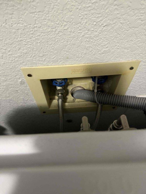 Completed comprehensive plumbing maintenance on 32-year-old residential property with 2,000 square feet. Inspected and serviced 11-month-old Ruud Achiever gas tank water heater located in garage, previously installed by our company in August 2025. Verified proper operation of all water heater components including temperature and pressure relief valve, gas connections with yellow flexible gas line, brass piping connections at top of unit, and blue pressure tank mounted above unit. Checked water heater for signs of leaks, corrosion, or sediment buildup. Inspected flexible braided metal water supply lines and gray corrugated flexible conduit at ceiling access point. Verified proper operation of shut-off valves including blue valve handles at ceiling access panel. Tested temperature settings and confirmed unit is heating efficiently. Inspected all visible plumbing connections throughout accessible areas of home. All components found to be functioning properly with no leaks detected. System