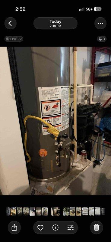 Completed comprehensive plumbing maintenance on a 6-year-old gas tank water heater located in the garage. Performed visual inspection of the unit, verified proper operation of temperature and pressure relief valve, checked gas connections including the flexible yellow gas line for leaks and proper installation, and inspected all copper supply and discharge piping for corrosion or deterioration. Documented water pressure readings using the system gauge, confirmed all manufacturer labels and safety warnings remain legible, and verified proper clearances around the unit. All components found to be functioning within normal parameters with no immediate concerns identified.