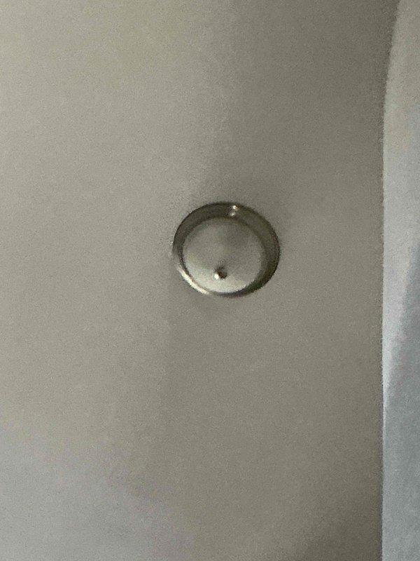 Responded to chirping smoke detector complaint at 3,337 sqft residence with vaulted ceilings. Replaced all 8-10 hardwired smoke detectors that had reached their 10-year service life with new long-life units, including specialized installation on vaulted ceiling areas requiring extended ladder access. Additionally addressed flickering foyer lighting circuit and replaced failed LED fixture previously installed by our team, restoring full functionality to all lighting zones.