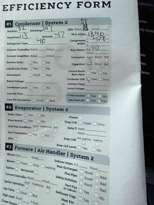 Responded to no cooling complaint on upstairs system at residential property with two HVAC systems. Performed comprehensive diagnostic evaluation on 11-year-old System 2, including condenser unit inspection with refrigerant pressure readings, amperage draw verification at 13.46 amps RLA, and assessment of electrical components including contactor, capacitor, and disconnect. Evaluated evaporator coil for leaks and proper drainage, confirmed drain line clear and auxiliary pan condition. Inspected air handler blower assembly, verified proper airflow, and assessed overall system operation. Documented findings on efficiency form with detailed measurements of suction and discharge pressures, component conditions, and system performance parameters to determine root cause of warm air discharge from upstairs zone.