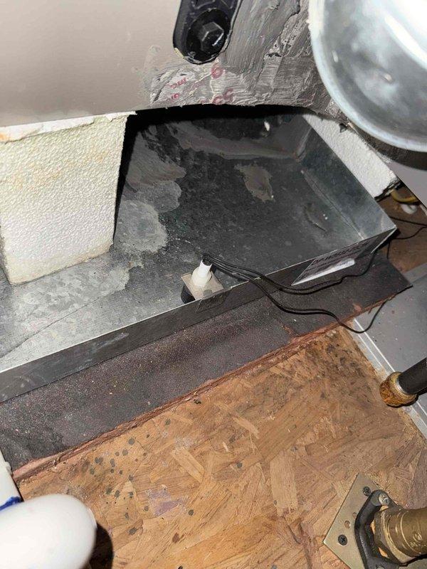 Responded to no cooling complaint on upstairs system at residential property with two HVAC systems. Performed comprehensive diagnostic evaluation on 11-year-old System 2, including condenser unit inspection with refrigerant pressure readings, amperage draw verification at 13.46 amps RLA, and assessment of electrical components including contactor, capacitor, and disconnect. Evaluated evaporator coil for leaks and proper drainage, confirmed drain line clear and auxiliary pan condition. Inspected air handler blower assembly, verified proper airflow, and assessed overall system operation. Documented findings on efficiency form with detailed measurements of suction and discharge pressures, component conditions, and system performance parameters to determine root cause of warm air discharge from upstairs zone.