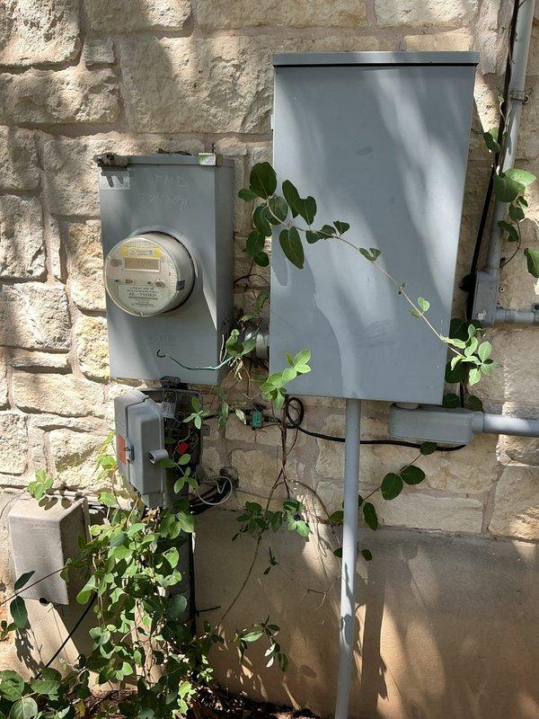 Responded to service call for recurring breaker trip issue affecting kitchen appliances in 28-year-old residence. Investigated electrical panel located in garage and determined kitchen circuit was overloaded when stove and refrigerator operated simultaneously. Inspected exterior electrical service equipment and meter panel for signs of deterioration or capacity issues. Examined kitchen appliance connections and under-cabinet wiring infrastructure to identify potential circuit loading problems. Documented existing electrical system configuration and provided recommendations for circuit upgrades to prevent future nuisance tripping and ensure safe operation of major kitchen appliances.