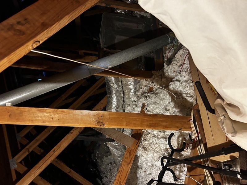 Conducted sales consultation at 1995-built, single-story residential property in response to buyback mailer for 15-year-old two-stage 4-ton central air conditioning system with no documented maintenance history. Performed visual inspection of existing HVAC equipment located in attic space, noting insulated ductwork, refrigerant lines, and blown-in attic insulation conditions. Assessed system as end-of-life replacement candidate given age and lack of service records. Presented full system replacement options and membership program benefits to homeowner as primary solution for aging equipment.