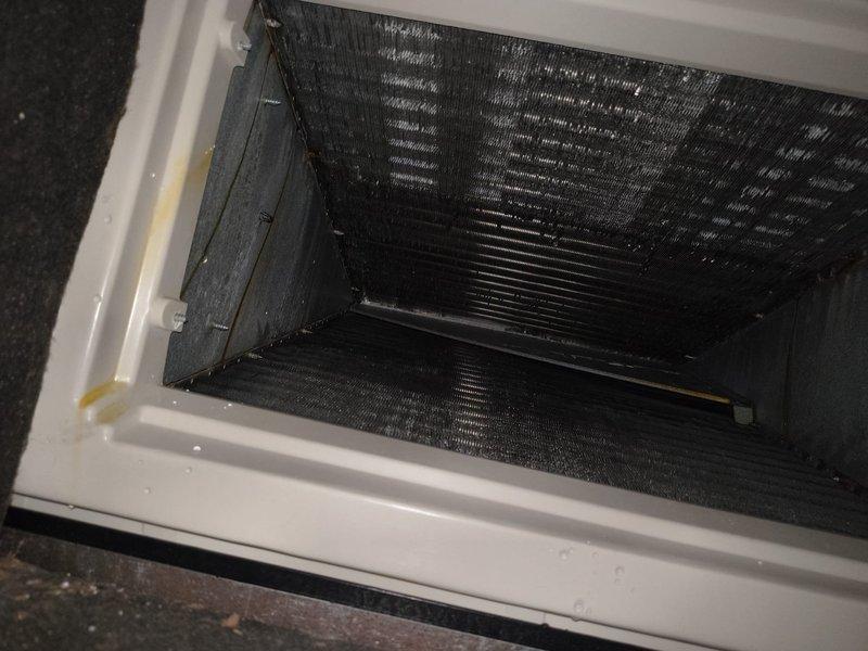 Completed member maintenance inspection on a 6-year-old HVAC system located in the attic of a 2,512 square foot residential property. Performed comprehensive visual assessment of the air handler unit and associated components. Inspected return air grille and filter assembly, noting significant dust and debris accumulation on the mesh filter and evaporator coil fins, indicating need for routine filter replacement and potential coil cleaning. Examined air handler drain pan, condensate drainage system, and associated PVC piping for proper operation and potential blockages. Verified refrigerant line insulation integrity on both suction and liquid lines. Checked electrical connections and control wiring for secure termination. Documented system condition through photographic documentation showing filter contamination levels and overall equipment installation. System operational at time of inspection with homeowner reporting satisfactory cooling performance on hot days and no hot or cold spo