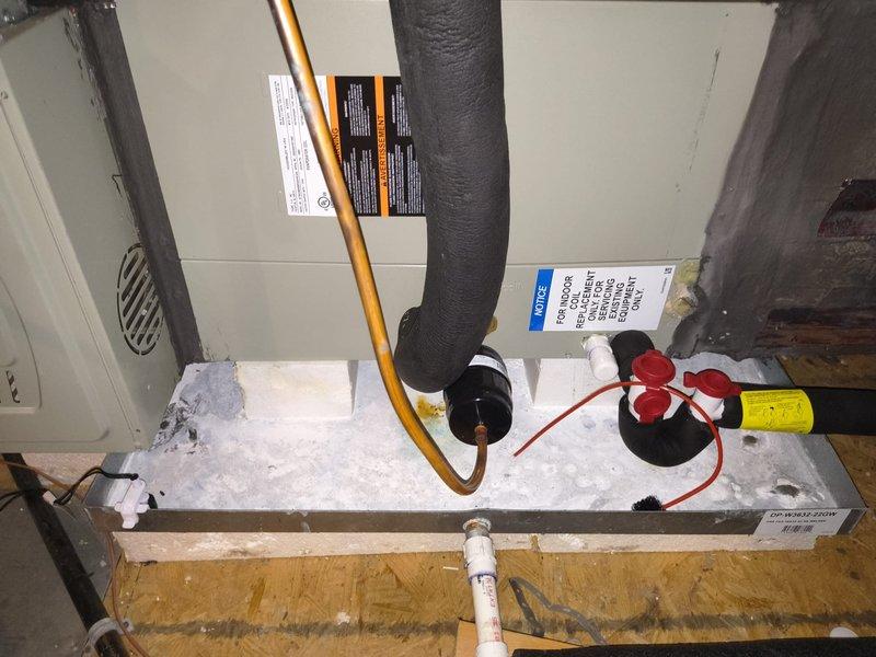 Completed member maintenance inspection on a 6-year-old HVAC system located in the attic of a 2,512 square foot residential property. Performed comprehensive visual assessment of the air handler unit and associated components. Inspected return air grille and filter assembly, noting significant dust and debris accumulation on the mesh filter and evaporator coil fins, indicating need for routine filter replacement and potential coil cleaning. Examined air handler drain pan, condensate drainage system, and associated PVC piping for proper operation and potential blockages. Verified refrigerant line insulation integrity on both suction and liquid lines. Checked electrical connections and control wiring for secure termination. Documented system condition through photographic documentation showing filter contamination levels and overall equipment installation. System operational at time of inspection with homeowner reporting satisfactory cooling performance on hot days and no hot or cold spo