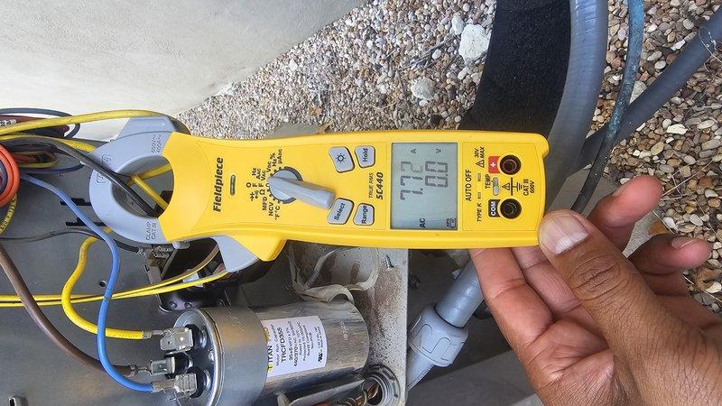 Responded to no cooling call with upstairs temperature reaching 93 degrees on a 2-6 year old attic system. Upon arrival, performed electrical diagnostics on the outdoor unit's capacitor and associated components using clamp meter. Measured amperage draw and verified capacitor performance, testing terminal connections and electrical values. System evaluated and measurements documented to determine proper operation of electrical components and refrigerant circuit functionality.