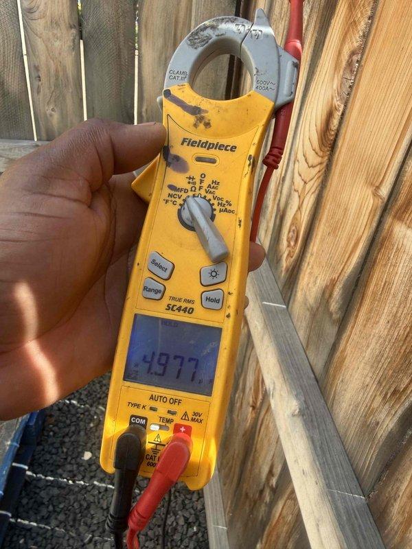 Completed comprehensive tune-up and maintenance on dual HVAC systems located in attic of 3,328 square foot residence. Performed electrical diagnostics using clamp meter to verify proper amperage draw and system performance on both 10-year-old units. Inspected rooftop electrical connections, conduit routing, and refrigerant line sets for proper installation and secure mounting.