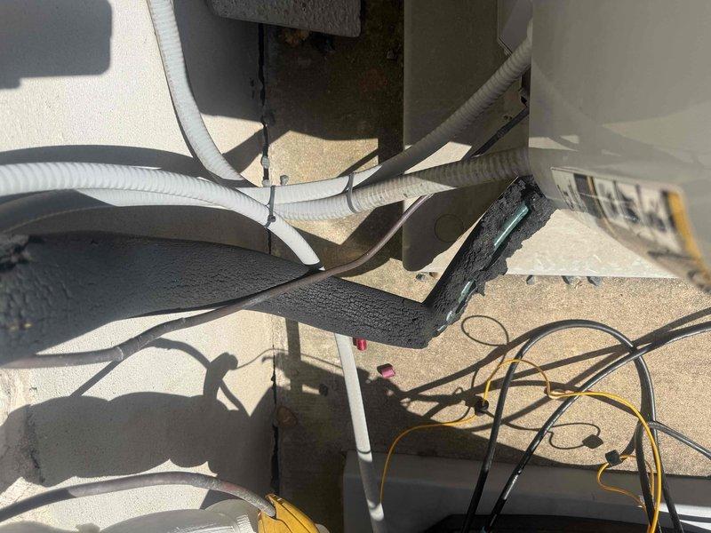 Completed comprehensive tune-up and maintenance on dual HVAC systems located in attic of 3,328 square foot residence. Performed electrical diagnostics using clamp meter to verify proper amperage draw and system performance on both 10-year-old units. Inspected rooftop electrical connections, conduit routing, and refrigerant line sets for proper installation and secure mounting.