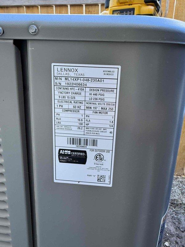 Responded to no-cooling call on 3-4 year old Lennox ML14XP1-048 split system in 2,714 square foot residential property. Upon arrival, confirmed outdoor condensing unit was not energizing despite thermostat calling for cooling. Performed systematic diagnostic evaluation of electrical components at outdoor unit. Tested dual run capacitor with multimeter and identified failed capacitor with readings outside manufacturer specifications. Capacitor showed no measurable capacitance on common-to-compressor terminal, preventing compressor from starting. Removed defective capacitor and installed OEM-equivalent replacement capacitor with proper microfarad ratings for both compressor and condenser fan motor circuits. Verified all wire connections were secure at capacitor terminals and contactor. Restored power to system and cycled unit through complete cooling operation. Confirmed compressor engaged properly, condenser fan motor operated at correct speed, and system achieved normal operating press