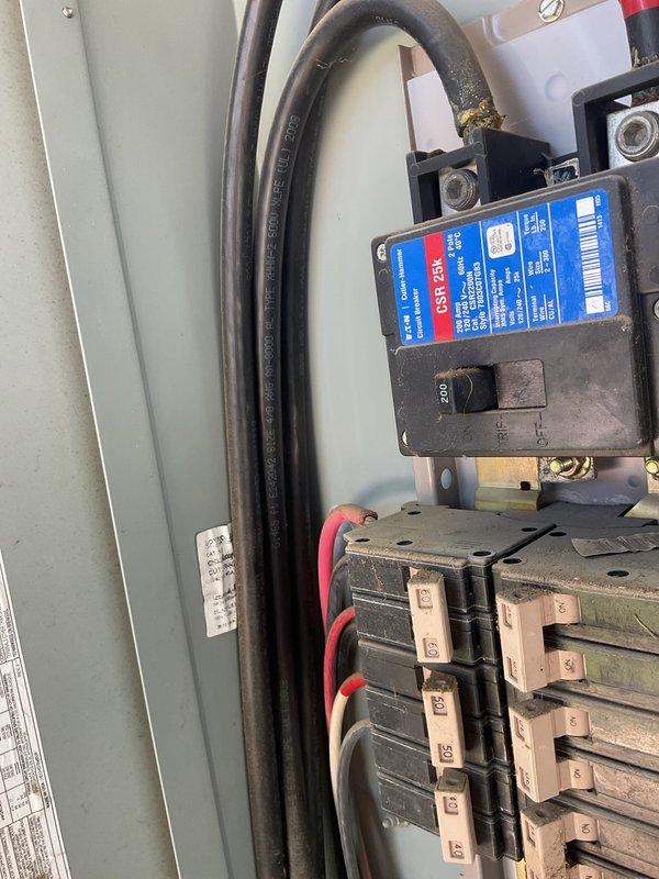 Responded to electrical service call at 18-year-old residential property for two reported issues: interior ceiling lights that ceased operation after audible noise, and non-functioning exterior ceiling fan. Conducted comprehensive electrical system inspection including main service panel evaluation and circuit breaker assessment. Inspected GFCI outlet installation and verified proper grounding and functionality. Performed visual inspection of main disconnect switch and branch circuit breakers for signs of overheating, arcing, or tripped conditions. Investigated potential wiring fault associated with reported audible noise from ceiling light fixture to rule out short circuit or arcing condition. Evaluated exterior ceiling fan circuit for power supply issues, switch malfunction, or motor failure. Documented electrical panel configuration and circuit protection devices with photographic evidence for service records.