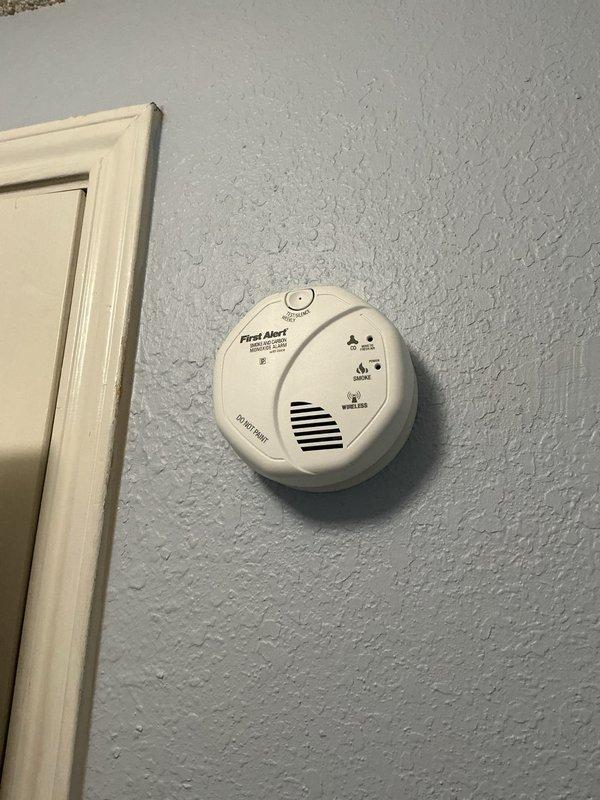 Responded to customer report of exterior breaker tripping approximately once per week. Inspected exterior electrical service panel and disconnect switch mounted on building exterior. Evaluated circuit breaker configuration, panel condition, and electrical connections. Documented existing Eaton disconnect and main panel installation with photographic evidence. Inspected interior smoke/carbon monoxide detector as part of comprehensive electrical safety assessment. All components found in serviceable condition with no visible damage or deterioration to equipment or conduit connections.