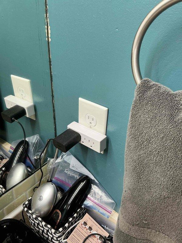 Returned to site to complete finish work on electrical installation. Installed two standard duplex receptacles in bathroom area with proper wall mounting and verified secure connections. Organized and labeled circuit breakers in main electrical panel, attached identification tags to multiple circuits for proper system documentation, and ensured all wiring connections were secure and code-compliant.