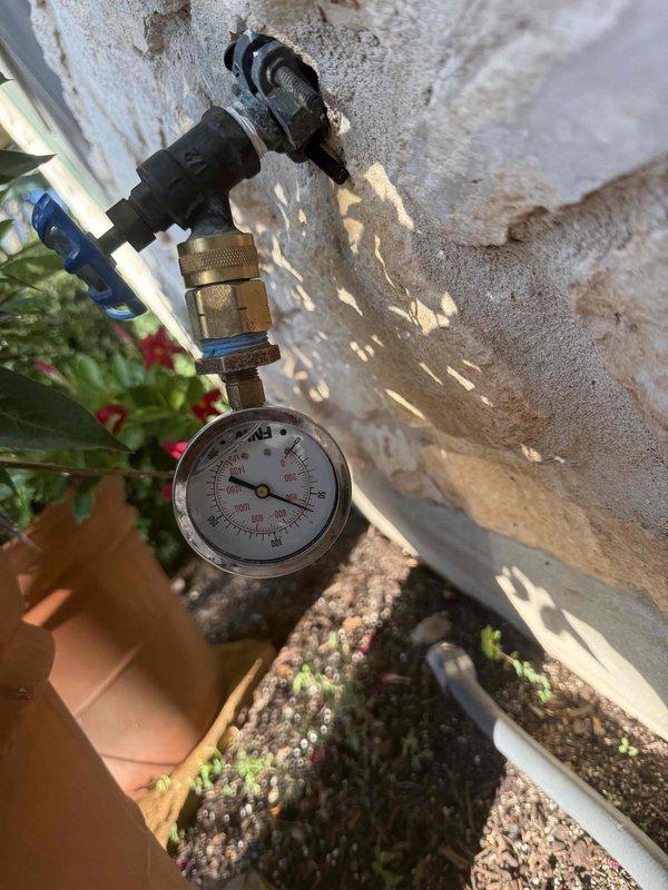 Replaced corroded hot water supply line and installed new thermal expansion tank to protect plumbing system from pressure damage. Tested system pressure with gauge and verified proper operation of shut-off valve.