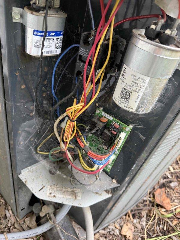 Responded to service call for HVAC system shutting off due to drain line issue. Upon arrival, performed diagnostic testing on 7-year-old attic-mounted unit using electrical testing equipment to verify system operation and measure voltage readings at 639V. Inspected internal components including dual capacitors, control board, and associated wiring connections. Addressed primary drain line blockage that was triggering safety float switch and causing system shutdown. Cleared obstruction from condensate drain system to restore proper drainage flow. Verified all electrical connections secure and tested system operation through complete cooling cycle to confirm unit running properly without shutoff issues.