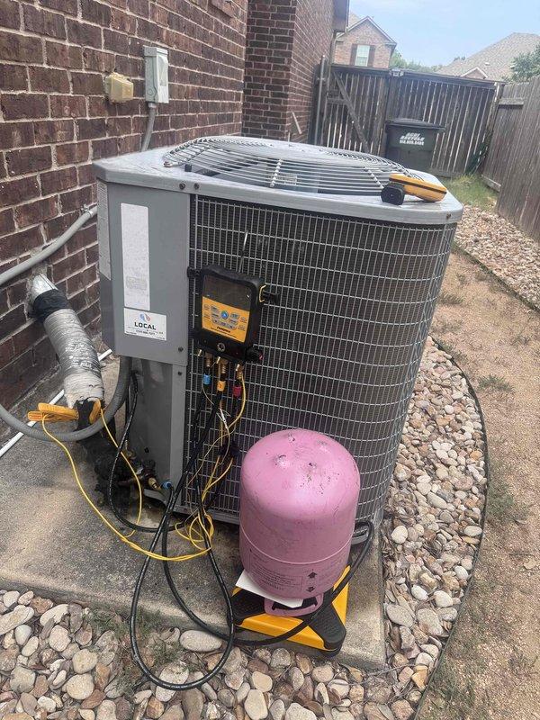 Performed complimentary leak search on residential air conditioning system. Conducted thorough inspection of outdoor condenser unit and associated refrigerant lines using diagnostic equipment. Documented system conditions with photographs showing unit configuration, pressure testing setup, and attic ductwork temperature readings of 77.2°F. Coordinated with team regarding customer's interest in proceeding with additional recommended work based on findings.