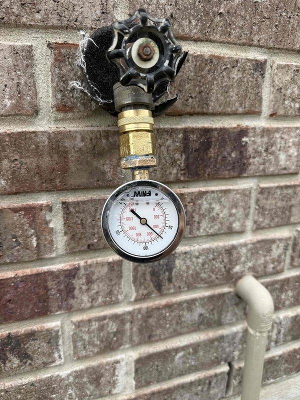 Completed comprehensive plumbing maintenance service on two gas-fired tank-type water heaters located in bedroom closet of 9-year-old residence. Performed full system flush on both units, which had not been serviced in over 6 years, removing sediment buildup to restore efficiency and extend equipment lifespan. Inspected and documented water pressure at main supply line using exterior gauge assembly, confirming proper system pressure within acceptable range.