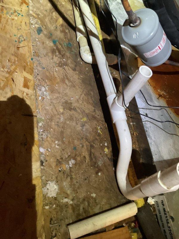 Completed comprehensive maintenance inspection on two 22-year-old HVAC systems located in attic, addressing reported cooling performance concerns during high-temperature conditions. Inspected both condenser units positioned exterior on concrete pads, noting visible corrosion on top fan assemblies and evaluating heat exchanger coil condition. Verified condensate drain line routing and float switch operation in attic installation, inspecting PVC drainage system for proper flow and clearing potential blockages. Evaluated system airflow, refrigerant levels, electrical connections, and overall operational efficiency on both units to identify factors contributing to inadequate cooling performance on hot days.