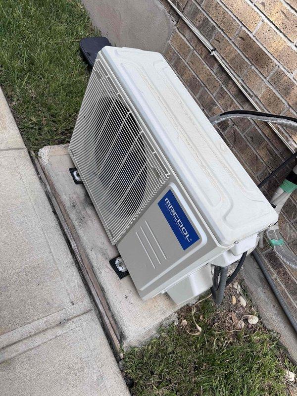 Completed scheduled fall/spring maintenance inspection on dual HVAC system serving 3,110 square foot residence. Performed comprehensive maintenance on outdoor condenser units including the newer Friedrich system and 20-year-old legacy system. Inspected MrCool condenser unit exterior components, verified proper mounting on isolation pads, checked refrigerant line connections and insulation integrity. Accessed electrical compartment to inspect wiring connections, terminals, and power supply components. Verified condenser coil condition through protective grille, confirmed adequate clearance around unit for proper airflow. Both systems operational at time of inspection with no immediate service needs identified.