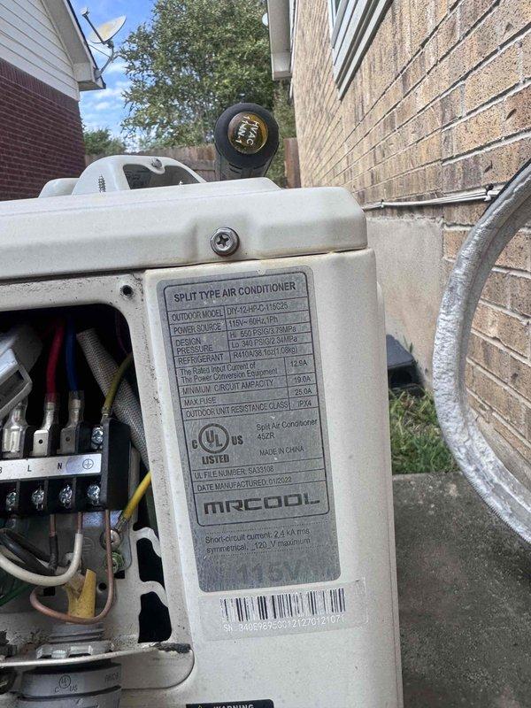 Completed scheduled fall/spring maintenance inspection on dual HVAC system serving 3,110 square foot residence. Performed comprehensive maintenance on outdoor condenser units including the newer Friedrich system and 20-year-old legacy system. Inspected MrCool condenser unit exterior components, verified proper mounting on isolation pads, checked refrigerant line connections and insulation integrity. Accessed electrical compartment to inspect wiring connections, terminals, and power supply components. Verified condenser coil condition through protective grille, confirmed adequate clearance around unit for proper airflow. Both systems operational at time of inspection with no immediate service needs identified.