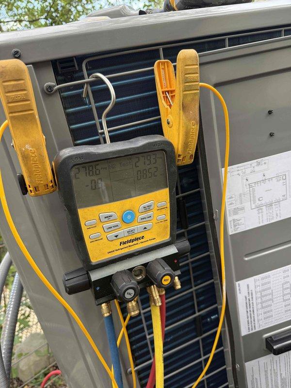 Successfully installed a new 3-ton side discharge variable speed heat pump system with matching air handler. The installation included complete system setup with proper refrigerant charging, electrical connections at the outdoor unit's control panel, and verification of all operating parameters using digital manifold gauges. All refrigerant lines were properly connected and tested, with system diagnostics confirming optimal performance levels. The existing filtration system was retained per specifications. The complete installation is backed by a 10-year parts and labor warranty, and financing was arranged through Synchrony Financial.