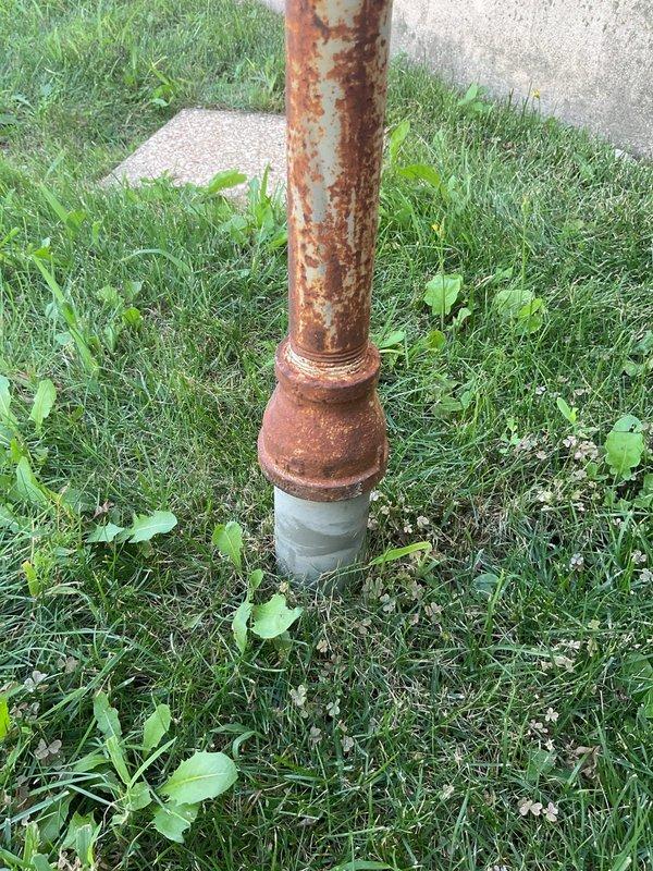 Installed gas line hookup with quick-disconnect fitting for portable generator at exterior of residence. Connected copper gas piping from existing supply to outdoor generator connection point, completing the fuel supply portion of the generator installation project coordinated with electrical and HVAC trades.