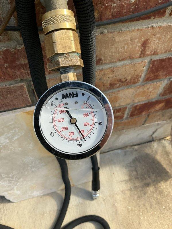 Responded to service call for PRV replacement and water heater inspection at residential property. Upon arrival, tested incoming water pressure using calibrated gauge, which confirmed elevated system pressure requiring PRV replacement. Inspected existing gas water heater and verified unit age and condition. Presented customer with three service options: Option A included 50-gallon natural gas water heater replacement with manufacturer warranty, safety/code upgrades, permit, PRV replacement, and expansion tank installation; Option B featured 30-gallon water heater with 6-year warranty, safety/code compliance items, permit, PRV and expansion tank; Option C consisted of PRV and expansion tank installation only. Documented pressure readings and equipment conditions with photographic evidence for customer records.