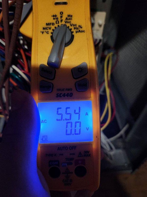 Completed routine member maintenance on one-year-old HVAC system located in attic. Performed comprehensive inspection of all system components, verified proper operation, and measured electrical parameters using multimeter showing 5.54 amperes draw, confirming unit is operating within manufacturer specifications. System running efficiently with no issues identified at this time.