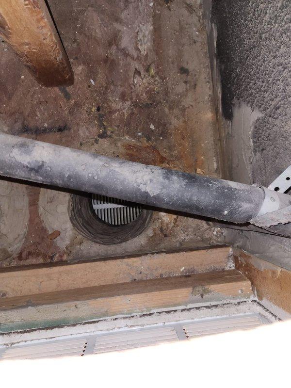 Completed member maintenance on a 4.5-year-old zoned communicating heat pump system located in interior closet. Performed comprehensive inspection of evaporator coil, noting moderate dust and debris accumulation on lower fin sections with heavier particulate buildup restricting airflow. Cleaned coil surfaces and verified proper condensate drainage through floor drain. Inspected all accessible refrigerant lines, electrical connections, and mechanical components. Replaced air filters per customer request. System operating within normal parameters following maintenance procedures.