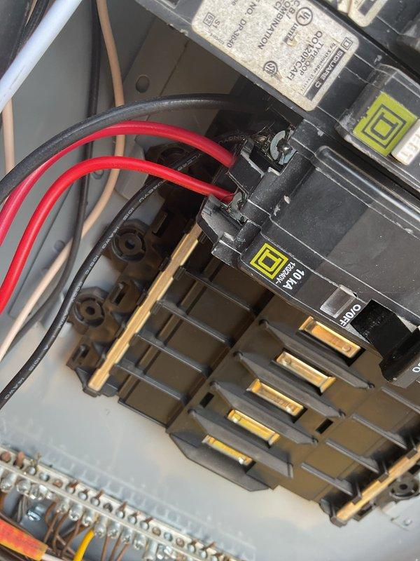 Responded to electrical service call regarding surge protection system concerns identified during previous whole-home maintenance inspection. Upon arrival, assessed existing surge protection device and electrical panel configuration. Identified improper wiring connections at main breaker panel affecting surge protector functionality. Corrected surge protection wiring to ensure proper operation and verified device status indicators showing active protection at 38,000 amp rating. Documented existing panel conditions including circuit breaker arrangement and bus bar connections with photographic evidence. Provided estimate for immediate surge protection concerns as requested, noting additional wiring configuration issues present that may require future attention.