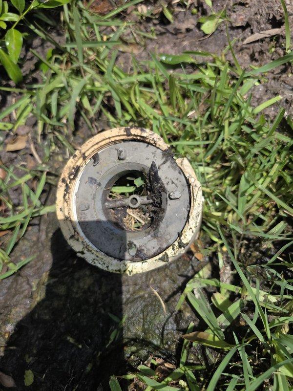 Responded to reported gurgling sounds at toilet, shower, and kitchen sink indicating potential drainage obstruction. Conducted full-house drain assessment to identify source of blockage affecting multiple fixtures. Located and accessed main sewer cleanout in yard area. Performed cable augering of main drain line to clear accumulated debris and restore proper flow. Verified all fixtures draining properly with no gurgling upon completion. Recommended periodic drain maintenance to prevent future buildup in system.