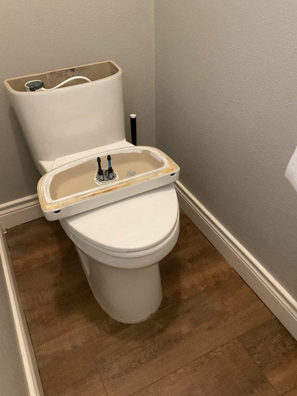 Responded to complaint of sewer gas odor in master bathroom. Upon investigation, removed toilet to access closet flange and identified source of odor. Found toilet flange exhibiting heavy rust and corrosion with deteriorated seal integrity. Removed toilet, documented corroded flange condition, and prepared area for flange replacement to eliminate sewer gas infiltration into living space.