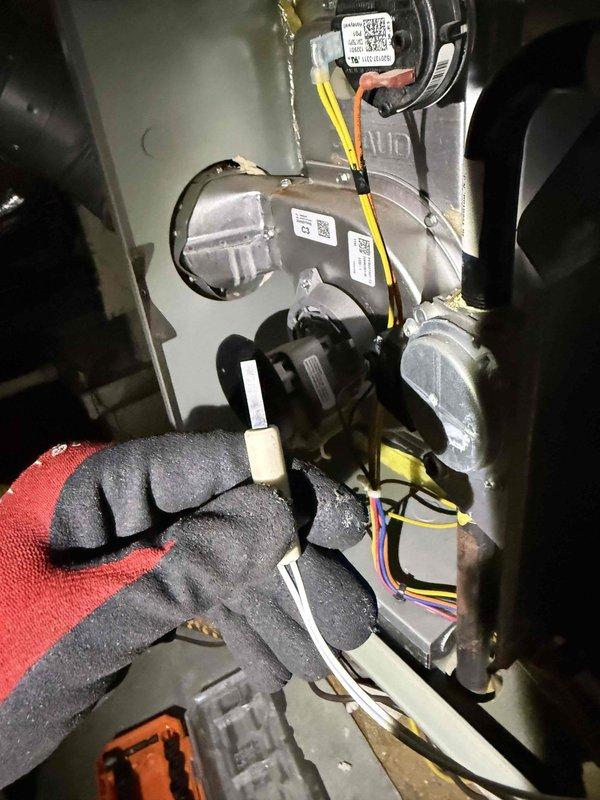 Returned to complete previous work on HVAC system. Accessed blower assembly and motor compartment, performed necessary adjustments and connections to blower motor and electrical components. System inspected for proper operation with all components secured and functioning as designed.