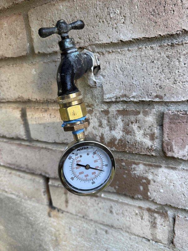 Responded to new customer service call at 40-year-old residential property to address multiple plumbing concerns. Evaluated non-flushing toilet and diagnosed issue preventing proper operation. Inspected kitchen sink faucet handle assembly and assessed functionality of pull-down spray mechanism. Consulted with homeowner regarding specifications for new toilet replacement and provided recommendations for ordering and installation. Tested outdoor hose bib and verified static water pressure reading using gauge. Documented all findings with photographs for service records and coordinated with electrical trade also scheduled onsite for separate bathroom ventilation issue.