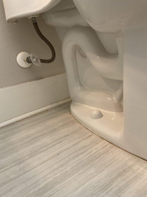 Responded to a loose, wobbling toilet in the front guest bathroom. Removed the toilet and found the old wax ring failed, with heavy residue and staining on the closet flange. Cleaned the flange and mating surfaces, installed a new wax seal, reset the toilet on the existing closet bolts, and secured it level and stable. Reconnected the supply line, restored water, and tested for leaks and proper operation, then resealed the base to the floor.