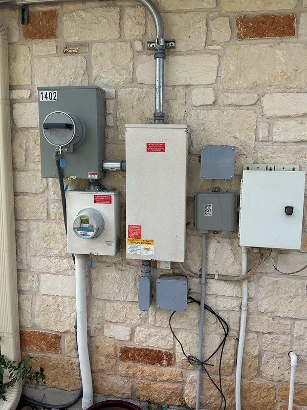 Installed new surge protection devices at the exterior HVAC unit location per the customer's request and disconnected the hot tub from its 240V supply. The exterior electrical equipment, including the service meter, disconnects, Enphase unit, and conduit runs, was inspected and showed no visible damage, rust, or corrosion.