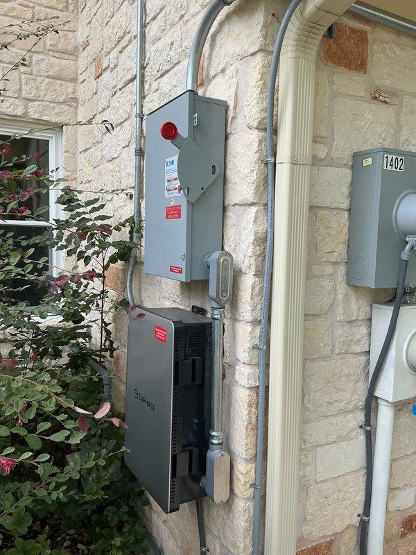 Installed new surge protection devices at the exterior HVAC unit location per the customer's request and disconnected the hot tub from its 240V supply. The exterior electrical equipment, including the service meter, disconnects, Enphase unit, and conduit runs, was inspected and showed no visible damage, rust, or corrosion.