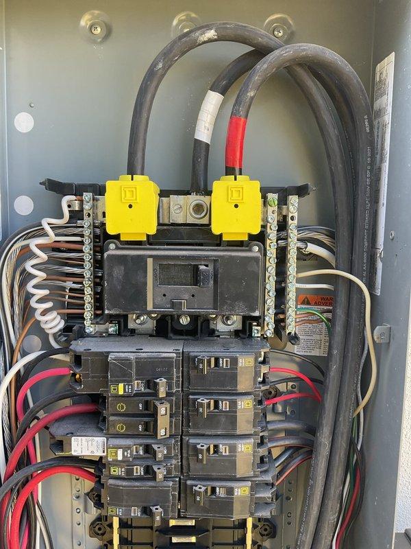 Responded to multiple tripped breakers and inoperative automatic lighting. Inspected the main service panel, including the main breaker, lug connections, terminal bars, and branch circuit breakers, and found no visible signs of overheating, corrosion, or physical damage. Evaluated the affected recessed LED fixture and associated lighting circuit to identify the cause of the outage and tripping.