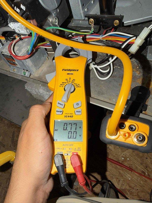 Performed seasonal preventive maintenance on two attic-mounted systems, inspecting major components and verifying operation. Used a true RMS clamp meter to measure amperage draw on the furnace's electrical circuits and motor components, confirming readings were within normal operating range. No faults or abnormal conditions were identified, and both systems were left operating normally.