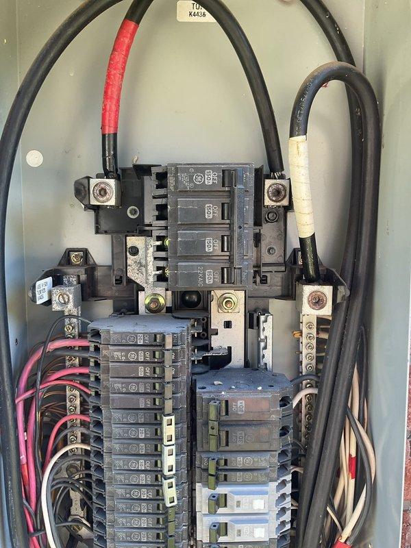 Performed a whole-home electrical maintenance inspection on the single GE main service panel, including the main breaker bank, service entrance conductors and lugs, branch circuit breakers, and conduit entry. The panel enclosure is intact with no evident rust, moisture intrusion, or breakage, and the service conductors and lugs showed no visible damage. Documented a congested, disorganized bundle of branch conductors in the lower enclosure, along with accumulated dirt, debris, and insect residue at the panel base and knockouts, and recommend cleaning and conductor management to support safe long-term operation and establish an electrical baseline for the home.