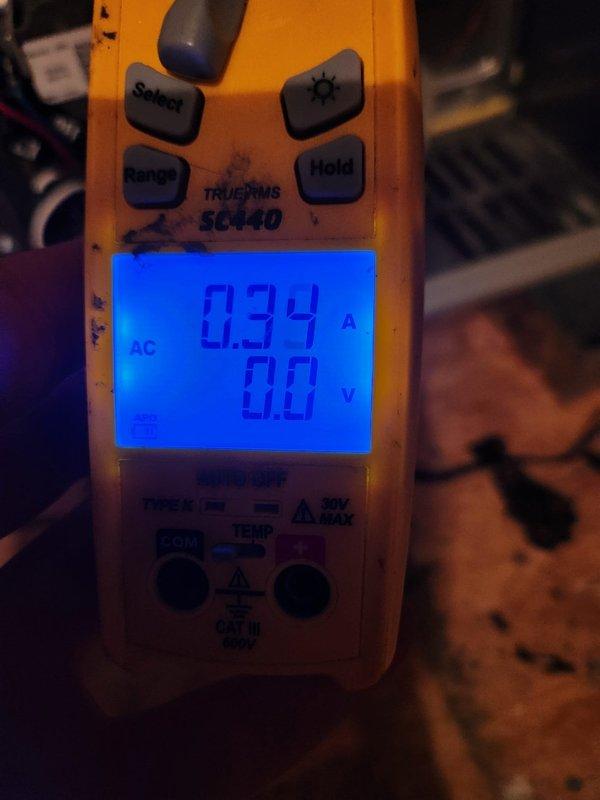 Performed seasonal maintenance on the attic-installed gas furnace system. Inspected the burner assembly and heat exchanger cabinet, confirming proper flame characteristics with a steady blue burner flame, and checked the gas valve connections, wiring, and cabinet fasteners. Noted minor surface rust and mineral residue on the cabinet channel. Measured component amperage with a clamp meter to verify electrical operation within normal parameters.