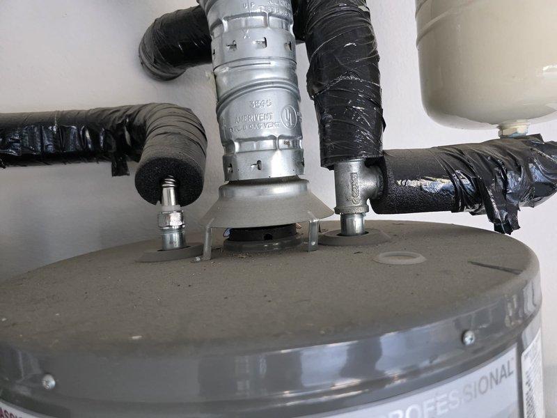Performed a flush on two gas tank-style water heaters, draining and removing sediment from each tank to restore efficiency and extend service life. Inspected both units, including flue/draft hood venting, insulated supply lines, gas connections, and the expansion tank, and found no visible leaks, rust, or damage, with the system left in proper working order.