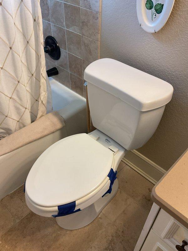 Repaired the toilet in the secondary unit above the garage, which required manual tank refilling, by servicing the tank fill and flush components and restoring proper automatic water level and refill operation. Replaced the elongated toilet seat and secured the assembly, then installed a new widespread bathroom faucet with two handles and a center spout at the vanity, replacing the existing oil-rubbed bronze unit that had heavy mineral buildup. Verified all connections for leaks and confirmed proper operation of the toilet and faucet.