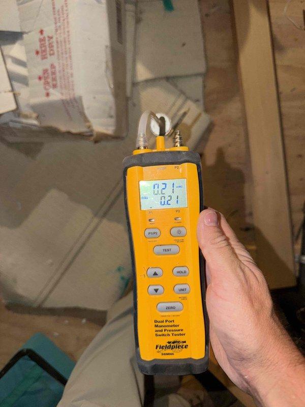 Performed dryer vent cleaning, removing accumulated lint and debris from the exhaust duct to restore proper airflow and reduce fire risk. Verified duct airflow and static pressure using a dual-port digital manometer, confirming the vent system was operating within acceptable parameters after cleaning. Inspected the blower wheel and noted a light layer of dust buildup on the fan blades.