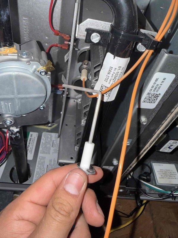 Performed seasonal maintenance on two attic-mounted gas furnace systems. Inspected and cleaned the flame sensor, and verified gas valve, draft inducer assembly, condensate drain line, wiring connections, and control board were in proper working condition. Both systems operated normally with no deficiencies found.