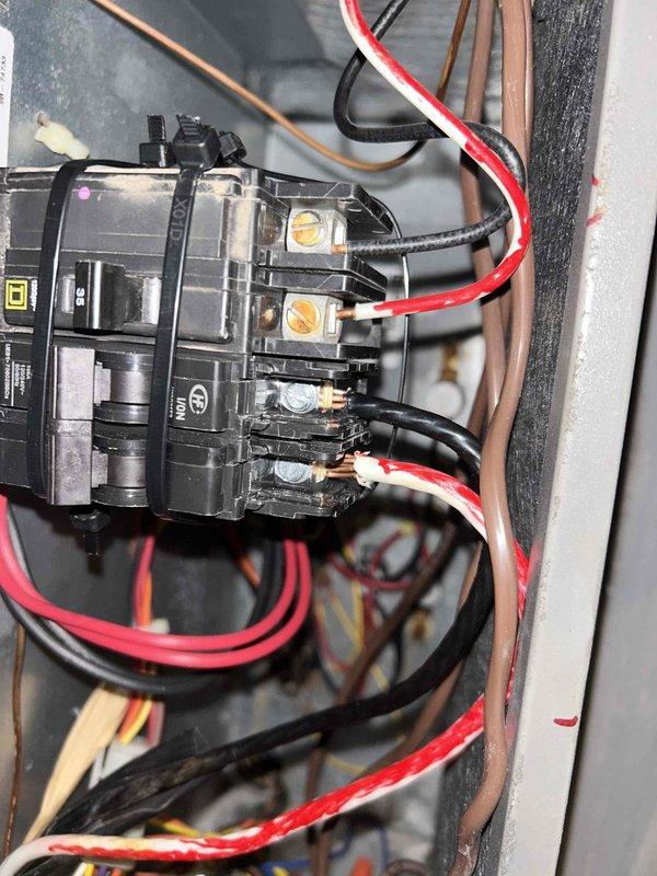 Returned to site and installed a new Square D 35A circuit breaker in the equipment cabinet, securing it with zip ties and terminating the line and load conductors at the breaker lugs. Inspected the existing wiring, noting dust accumulation and discolored, corroded terminal lugs with frayed conductor strands, and verified all connections were tight and properly seated. Restored power and confirmed the breaker was operating correctly.