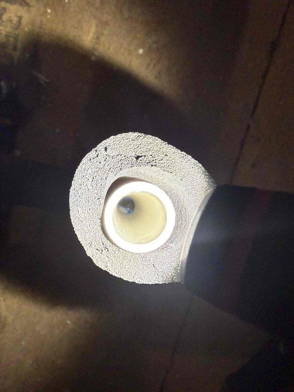 Performed a member maintenance inspection on a single attic-installed system, including a visual inspection of the condensate drain line and an evaluation of overall system operation. Found a dirty flame sensor and recommended cleaning to maintain reliable ignition and flame proofing. Also noted the absence of an air lock between the attic and conditioned space, allowing heat, cold, and dust infiltration through the attic access door, and the lack of indoor air quality protection (germ and virus mitigation). Documented all findings and recommendations on the summary of findings for follow-up.
