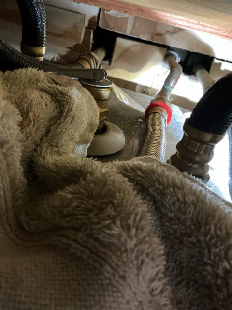 West Palm Beach, FL - I filled the holes in the drywall, behind the water heater, with foil and fill foam to block mice off from having access to the home.