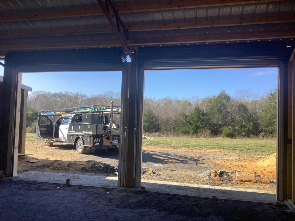 Montgomery, AL - Bronze roll up door were an excellent accent piece for this hunting camp.