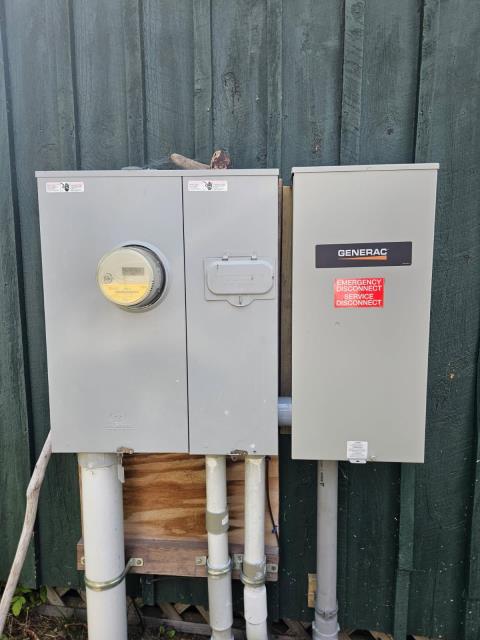 
Installation of a 14kW Generac generator with a 200 AMP service-rated transfer switch.