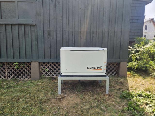 
Installation of a 14kW Generac generator with a 200 AMP service-rated transfer switch.
